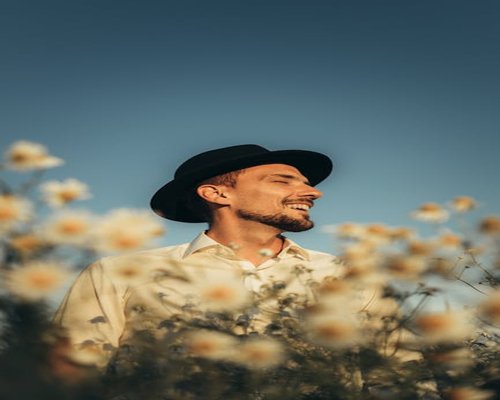 Portrait of happy indian man outdoors